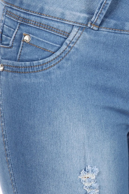 Close up of Skye Mid Rise Distressed Jeans W/ No Back Pockets in Light Blue
