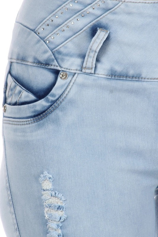 Close up of Studded High Waist Distressed Jeans W/ No Back Pockets in Light Blue