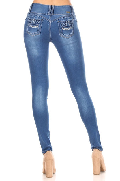 Back of Mid Rise Ripped Jeans W/ Embellished Pockets