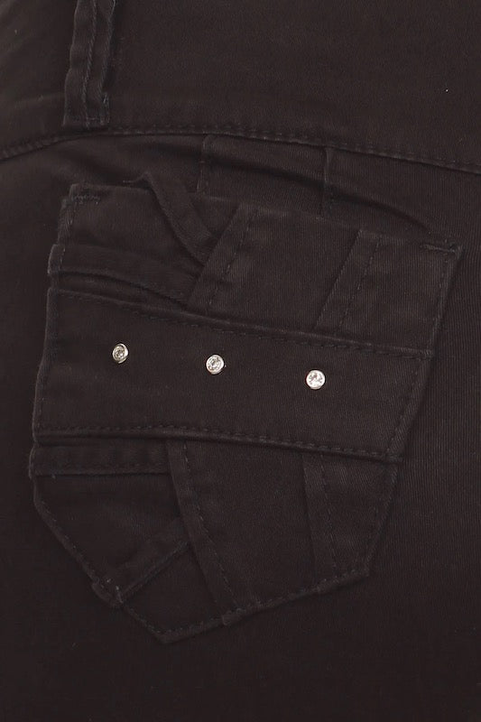 Close up of pocket of Noche Diamond Stuuded Jeans in Black