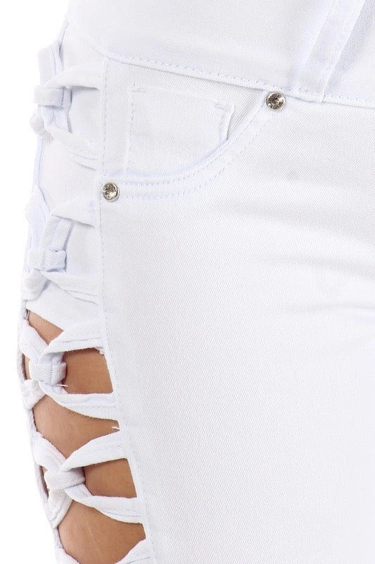 Close up of Avery No Pocket Jeans W/ Side Knots in Color white