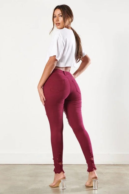 Back of Classic Distressed Legs Jeans in Burgundy Color
