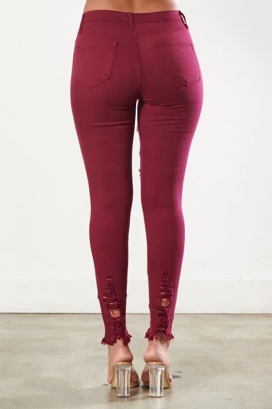 Back of Classic Distressed Legs Jeans in Burgundy Color