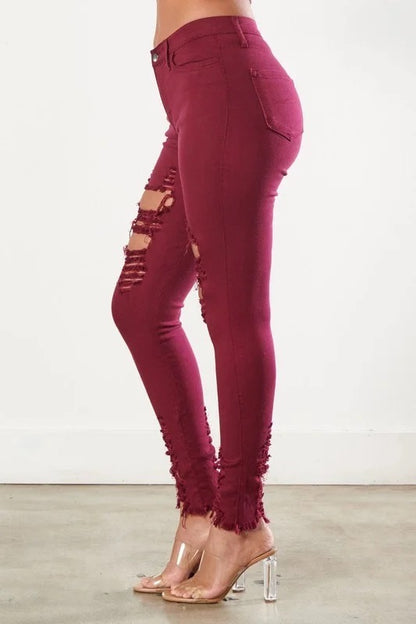 Side of Classic Distressed Legs Jeans in Burgundy Color