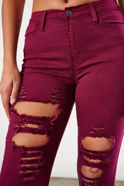 Close up of Classic Distressed Legs Jeans in Burgundy Color