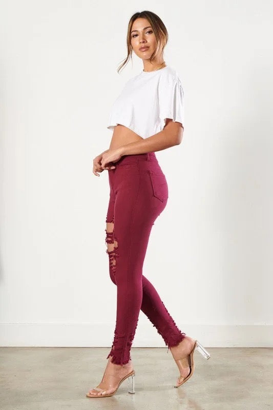 Side of Classic Distressed Legs Jeans in Burgundy Color