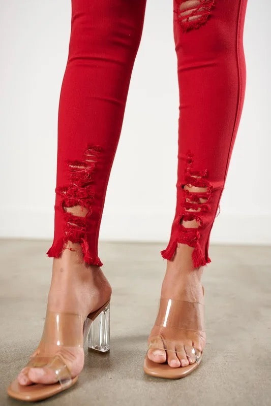 Close up of Classic Distressed Legs Jeans in Red