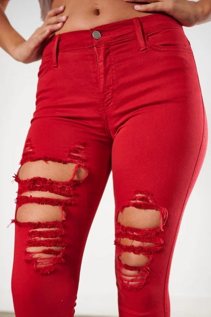 Close up of Classic Distressed Legs Jeans in Red