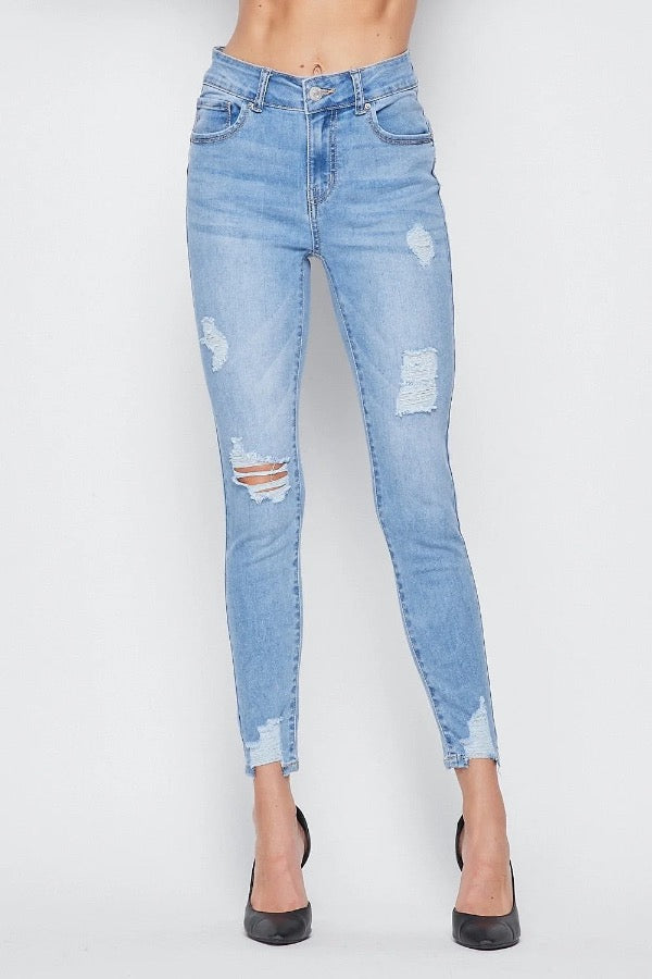 Figure Hugging Distressed Skinny Jeans in Light Blue Color