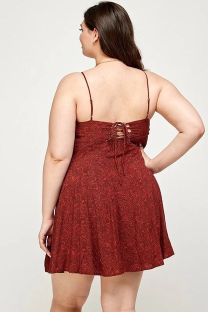back of Lovely Plus Leaf Print Mini Dress in rust color