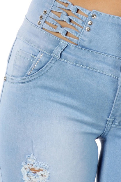 Close up of Denim Chain Ripped and Studded Jeans in Light Blue 