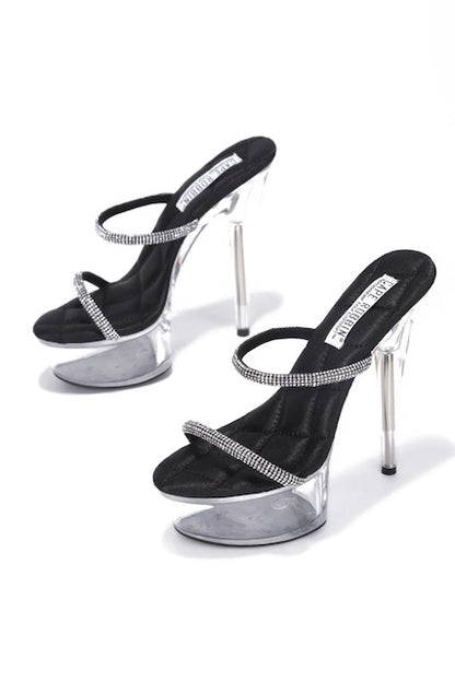 pair of black Ria Clear Platform Slip On High Heels With Rhinestone Straps